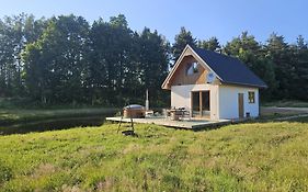 Domek Dotyk rosy na Kaszubach